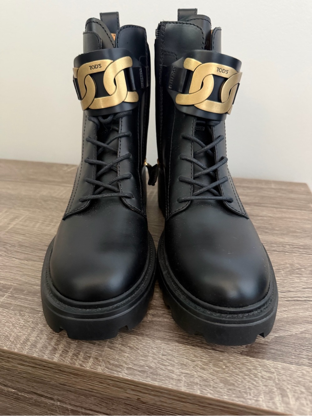 TOD'S Black Leather Chain-Accent Combat Boots, 41